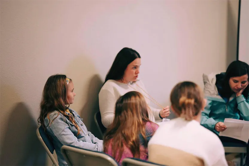 Girls listening to a lesson.