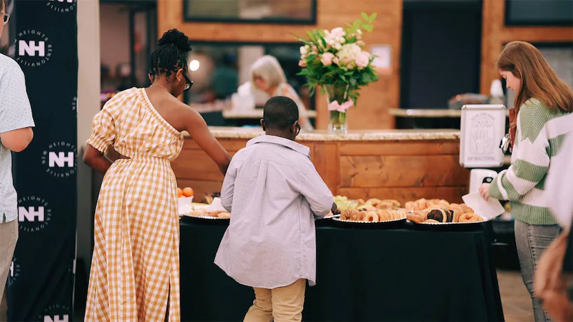 Two kids getting donuts