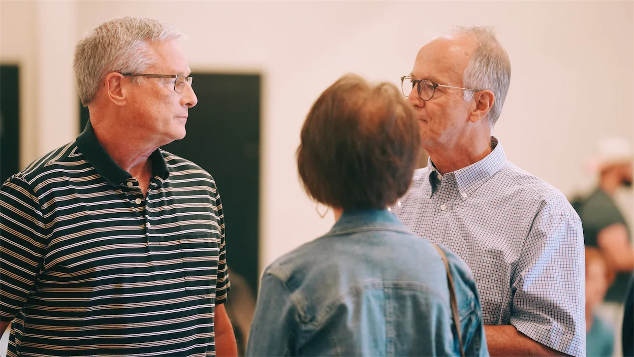 two older men talking