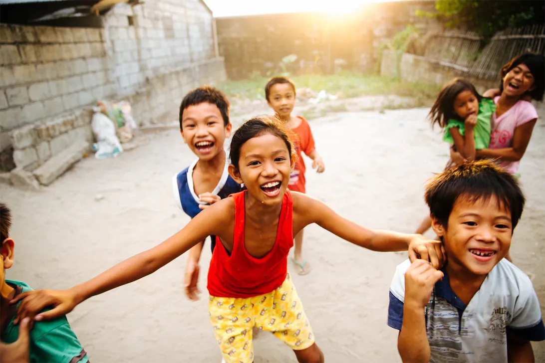 Kids in a third world country playing.